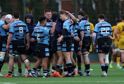080226 - Dragons U18s v Cardiff U18s - Regional Age Grade - Finn Britton of Cardiff celebrates kicking the match winning penalty with team mates