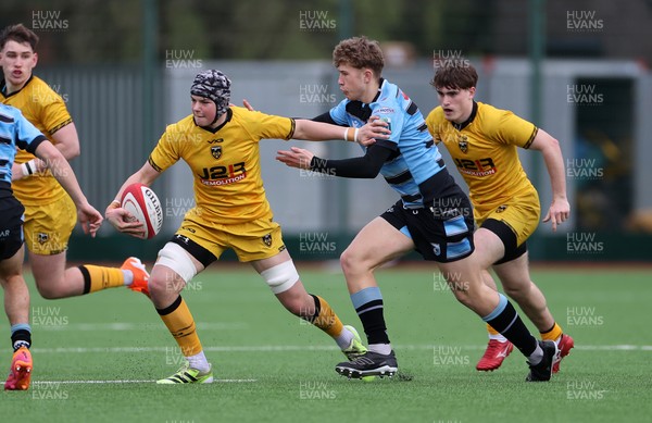 080226 - Dragons U18s v Cardiff U18s - Regional Age Grade - Jake Leighton of Dragons is tackled by Finn Britton of Cardiff 