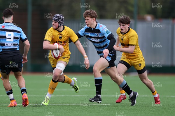 080226 - Dragons U18s v Cardiff U18s - Regional Age Grade - Jake Leighton of Dragons is tackled by Finn Britton of Cardiff 