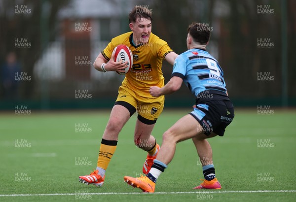 080226 - Dragons U18s v Cardiff U18s - Regional Age Grade - Tegwyn Mahoney of Dragons is tackled by Arthur Garfield of Cardiff 