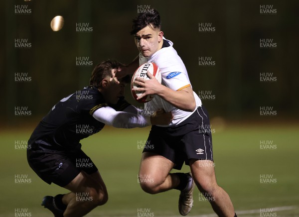 141222 - Dragons Under 18s v Ospreys Under 18s, WRU Regional Age Grade Championship - Sam Matthews of Ospreys gets past Oscar Watkins of Dragons