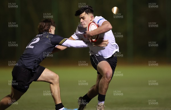 141222 - Dragons Under 18s v Ospreys Under 18s, WRU Regional Age Grade Championship - Sam Matthews of Ospreys gets past Oscar Watkins of Dragons