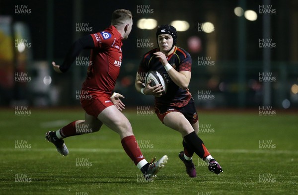120219 - Dragons U18s v Scarlets U18s - Regional Age Grade Final - Will Reed is tackled by Dean James