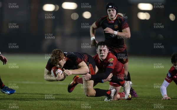120219 - Dragons U18s v Scarlets U18s - Regional Age Grade Final - Ollie Lewis is tackled by Josh Thomas