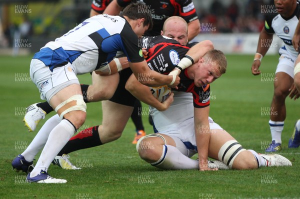 230813 - Newport Gwent Dragons v Bath, Pre-season Friendly - Dragons' Jack Dixon is tackled just before the line