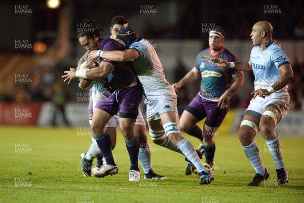 201012 - Newport Gwent Dragons v Aviron Bayonnais - Amlin Challenge Cup   Dragon's Andy Tuilagi, left, is tackled by Mark Chisholm of Bayonne 