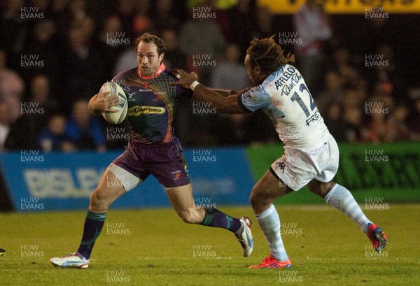 201012 - Newport Gwent Dragons v  Aviron Bayonnais - Amlin Challenge Cup   Dragons' Will Harries, left, is tackled by Thibault Lacroix of Bayonne 