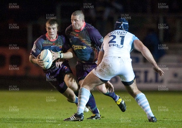 201012 - Newport Gwent Dragons v  Aviron Bayonnais - Amlin Challenge Cup   Dragon's Jonathan Evans runs with the ball past the Bayonne defence 