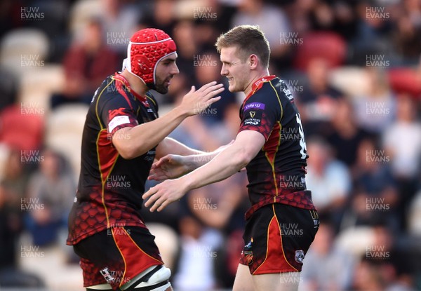 010918 - Dragons v Benetton - Guinness PRO14 - Dafydd Howells of Dragons celebrates his try with Cory Hill (Left)