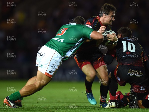 010918 - Dragons v Benetton - Guinness PRO14 - Rhodri Williams of Dragons is tackled by Tiziano Pasquali of Benetton