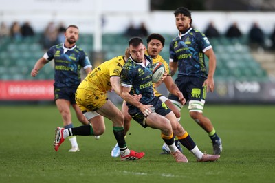 280226 - Dragons RFC v Benetton Rugby - United Rugby Championship - Matt Gallagher of Benetton Rugby is tackled by Angus O�Brien of Dragons 