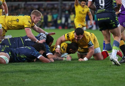 280226 - Dragons RFC v Benetton Rugby - United Rugby Championship - Levi Douglas of Dragons scores a try