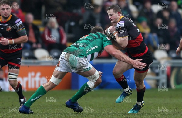 180218 - Dragons v Benetton Treviso - Guinness PRO14 - Hallam Amos of Dragons is tackled by Irne Herbst of Treviso