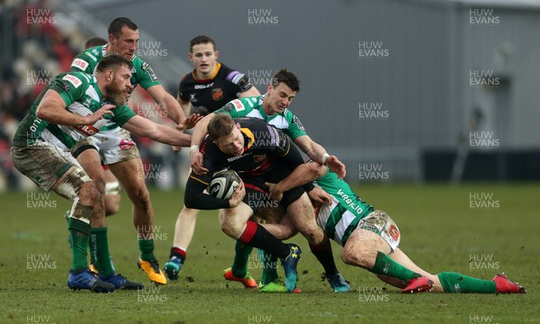 180218 - Dragons v Benetton Treviso - Guinness PRO14 - Jack Dixon of Dragons is tackled by Luca Morisi of Treviso