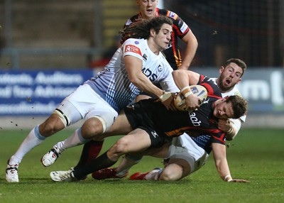 261213 - Newport Gwent Dragons v Cardiff Blues, RaboDirect PRO12 - Dragons Hallam Amos is tackled by Blues' Alex Cuthbert and Blues' Josh Navidi