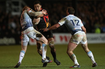 261213 - Newport Gwent Dragons v Cardiff Blues, RaboDirect PRO12 - Dragons Toby Faletau takes on Blues' Rhys Patchell and Blues' Dafydd Hewitt