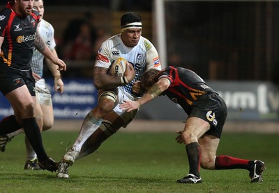 261213 - Newport Gwent Dragons v Cardiff Blues, RaboDirect PRO12 - Blues' Filo Paulo takes on Dragons Thomas Rhys Thomas