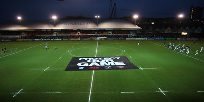 261213 - Newport Gwent Dragons v Cardiff Blues, RaboDirect PRO12 - A protest banner is placed on the pitch before the start of the match