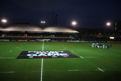 261213 - Newport Gwent Dragons v Cardiff Blues, RaboDirect PRO12 - A protest banner is placed on the pitch before the start of the match