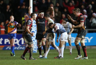 261213 - Newport Gwent Dragons v Cardiff Blues, RaboDirect PRO12 - Dragons Jason Tovey and Dragons Lewis Evans celebrate the win as the whistle blows