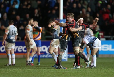 261213 - Newport Gwent Dragons v Cardiff Blues, RaboDirect PRO12 - Dragons Jason Tovey and Dragons Lewis Evans celebrate the win as the whistle blows