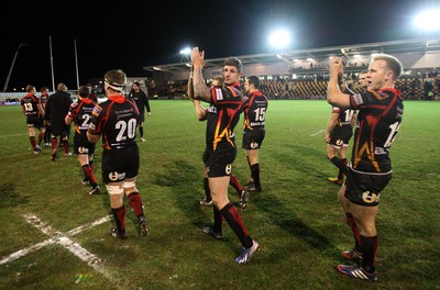 261213 - Newport Gwent Dragons v Cardiff Blues, RaboDirect PRO12 - Dragons players applaud the supporters after the win over the Blues