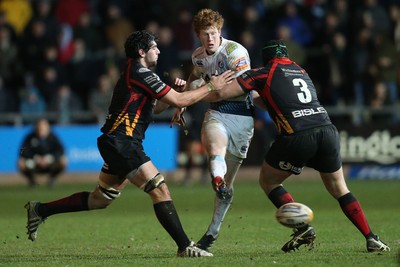 261213 - Newport Gwent Dragons v Cardiff Blues, RaboDirect PRO12 - Blues' Rhys Patchell kicks ahead as he's tackled