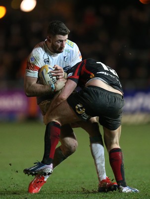 261213 - Newport Gwent Dragons v Cardiff Blues, RaboDirect PRO12 - Blues' Alex Cuthbert is tackled by Dragons Pat Leach