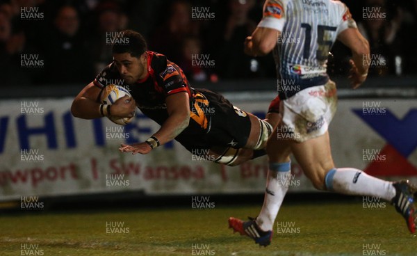 261213 - Newport Gwent Dragons v Cardiff Blues, RaboDirect PRO12 - Dragons Toby Faletau dives in to score try as Blues' Leigh Halfpenny closes in