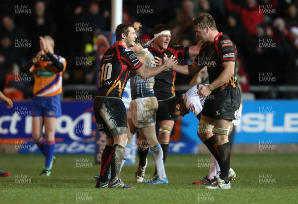 261213 - Newport Gwent Dragons v Cardiff Blues, RaboDirect PRO12 - Dragons Jason Tovey and Dragons Lewis Evans celebrate the win as the whistle blows