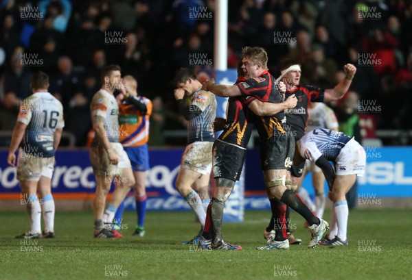 261213 - Newport Gwent Dragons v Cardiff Blues, RaboDirect PRO12 - Dragons Jason Tovey and Dragons Lewis Evans celebrate the win as the whistle blows