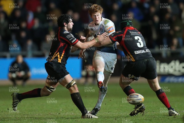 261213 - Newport Gwent Dragons v Cardiff Blues, RaboDirect PRO12 - Blues' Rhys Patchell kicks ahead as he's tackled