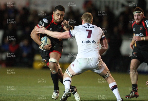 061213 - Newport Gwent Dragons v Bordeaux-Begles, Amlin Challenge Cup - Dragons Toby Faletau takes on Bordeaux-Begles Matt Graham