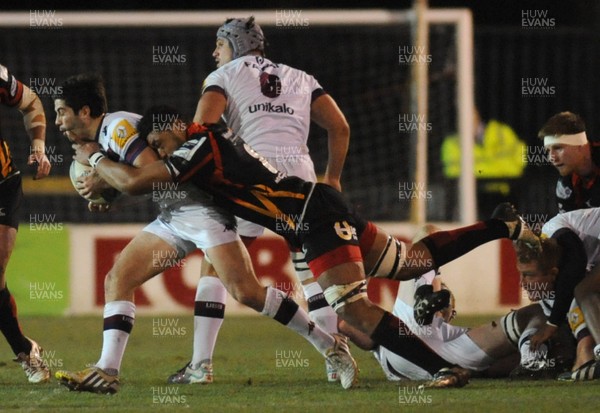 061213 - Newport Gwent Dragons v Union Bordeaux Begles - Amlin Challenge Cup -Toby Faletau of Newport Gwent Dragons tackles Manu Saubusse of Union Bordeaux Begles