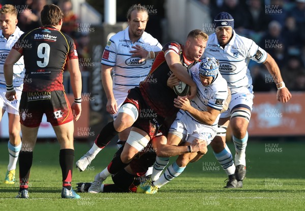 061018 - Dragons v Cardiff Blues, Guinness PRO14 - Matthew Morgan of Cardiff Blues is tackled by Ross Moriarty of Dragons