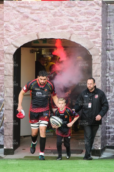 061018 - Dragons v Cardiff Blues - Guinness Pro 14 - Cory Hill runs out with the mascot