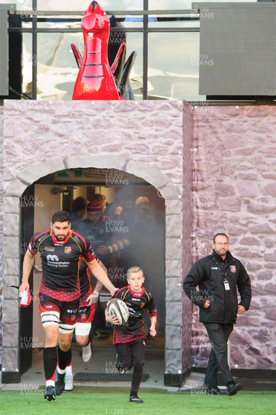061018 - Dragons v Cardiff Blues - Guinness Pro 14 - Cory Hill runs out with the mascot