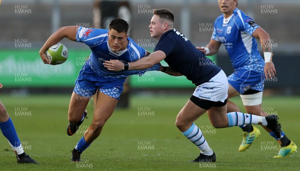 070918 - Dragons A v Cardiff Blues A - Celtic Cup - Jared Rosser of Dragons is challenged by Cam Lewis of Cardiff Blues
