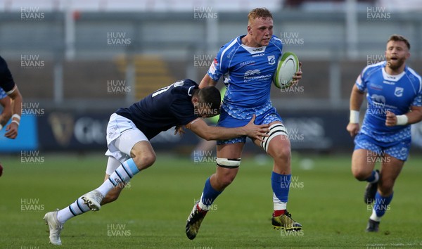 070918 - Dragons A v Cardiff Blues A - Celtic Cup - Ben Fry of Dragons is tackled by Aled Summerhill of Cardiff Blues