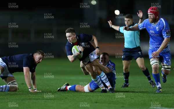 070918 - Dragons A v Cardiff Blues A - Celtic Cup - Cam Lewis of Cardiff Blues is tackled by Ben Fry of Dragons