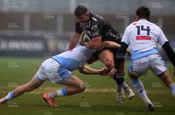 261220 - Dragons v Cardiff Blues - Guinness PRO14 - Elliot Dee of Dragons is tackled by Lloyd Williams of Cardiff Blues