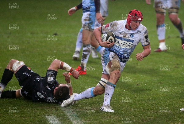 261220 - Dragons v Cardiff Blues - Guinness PRO14 - James Botham of Cardiff Blues is tackled by Harrison Keddie of Dragons