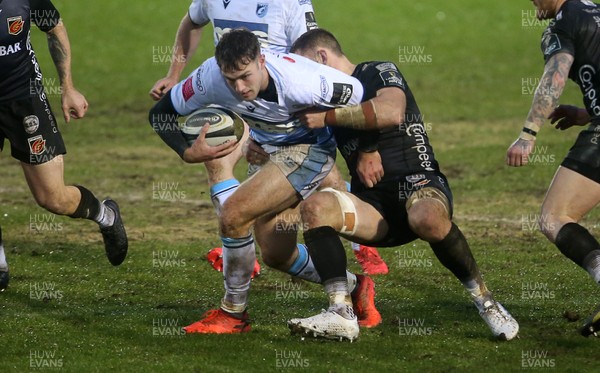 261220 - Dragons v Cardiff Blues - Guinness PRO14 - Max Llewellyn of Cardiff Blues is tackled by Harrison Keddie of Dragons