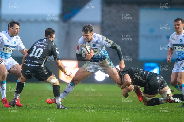 261220 - Dragons v Cardiff Blues - Guinness PRO14 - Max Llewellyn of Cardiff Blues is tackled by Harrison Keddie of Dragons
