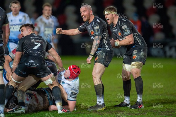 261220 - Dragons v Cardiff Blues - Guinness PRO14 - Tavis Knoyle of Dragons and Aaron Wainright of Dragons celebrate a turn over