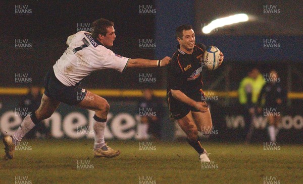 210106 -Newport Gwent Dragons v Castres Olympique - Heineken Cup - Dragons' Gareth Cooper goes past Guilaume Taussac 