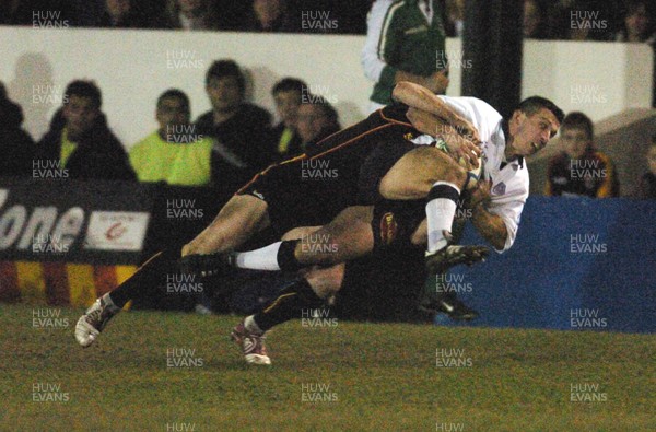 210106 - Heineken Cup Rugby Newport Gwent Dragons v Castres Castres' Roman Tuelet is tackled by Jason Forster 