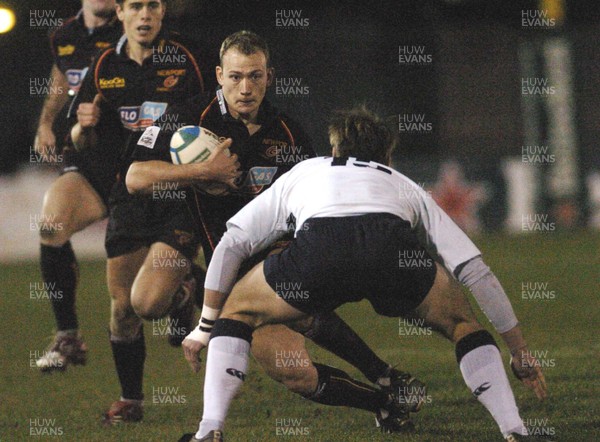 210106 - Heineken Cup Rugby Newport Gwent Dragons v Castres Newport's Richard Fussell looks for a way past Phil Christophers 