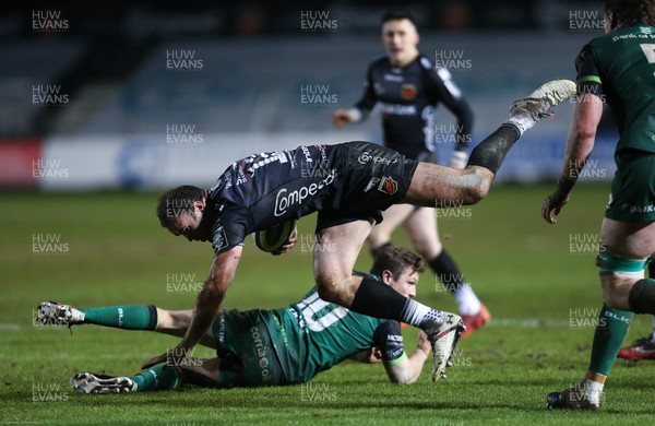 050221 - Dragons v Connacht, Guinness PRO14 - Jamie Roberts of Dragons is tackled by Jack Carty of Connacht