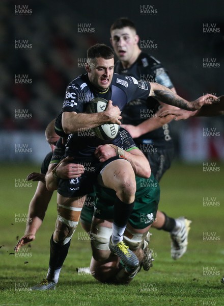 050221 - Dragons v Connacht, Guinness PRO14 - Josh Lewis of Dragons is tackled by the Connacht defence